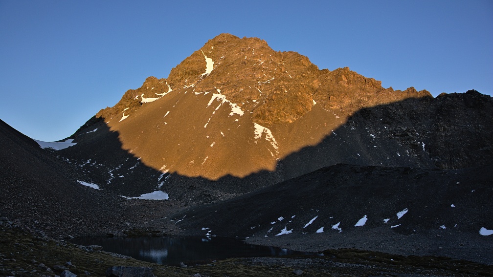 Unnamed peak 2,222 metres in morning sunlight