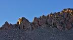 Rocky ridge above tarns in morning sunlight