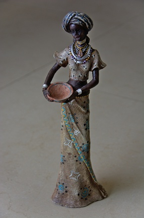 Statuette of African woman standing