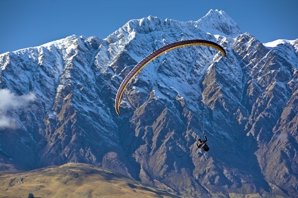 Paraglider with Queenstown Hill and Remarkables Double Cone