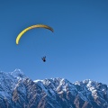 Paraglider above Remarkables range