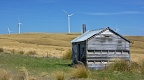 Derelict cottage and modern wind farm