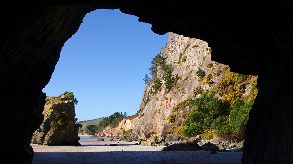 Cliffs and beach seen through the Arches