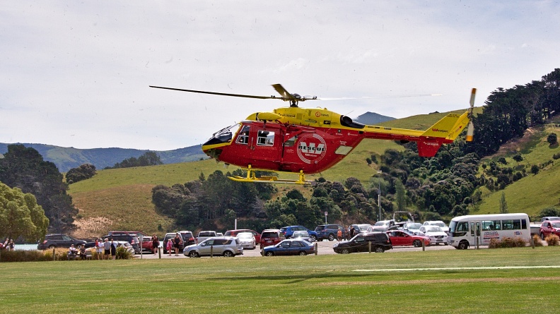 Dust from rescue helicopter landing in Akaroa