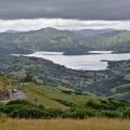 Akaroa Harbour and top of Long Bay Road on a cloudy day