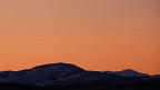Orange sunrise glow over Little Mount Ida