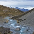 Downstream Cameron River and distant mountains