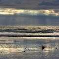 Sunbeams and reflections on the beach