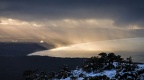 Dramatic morning crepuscular rays and Te Waewae Bay