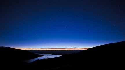 Fading stars above Lake Te Anau at dawn