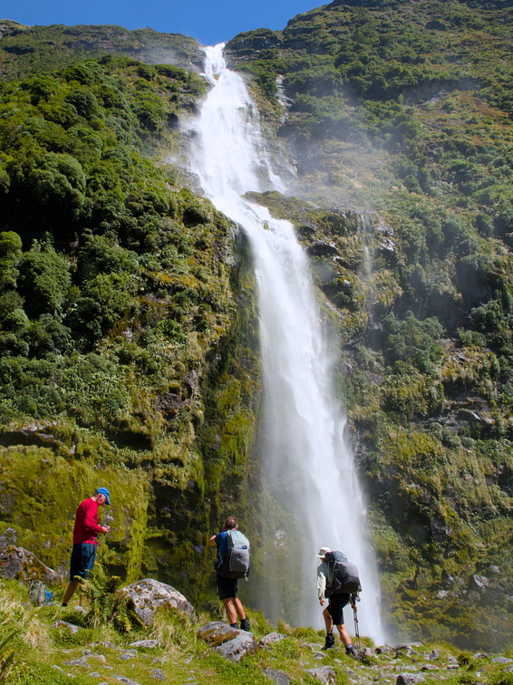 Sutherland Falls and trampers near the base